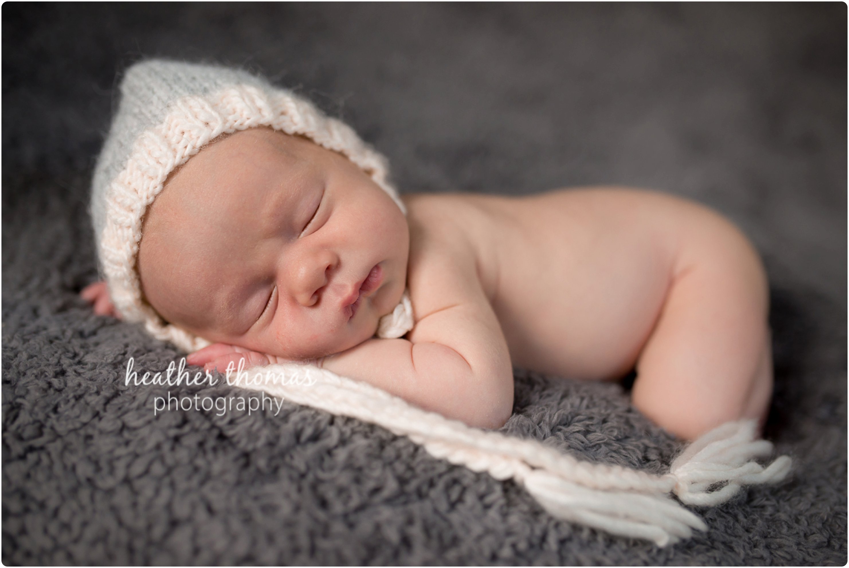 Newborn Photo Session| Bucks County PA Newborn Photographer newborn boy curled up posing for his newborn photos in newtown pa