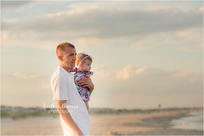 ocean-city-nj-beach-photographers-39.jpg dad and daughter looking at the ocean