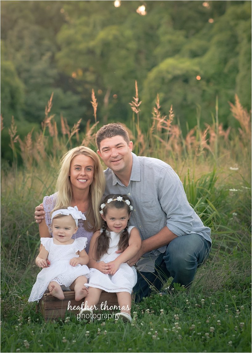 professional-photographer-philadelphia-42.jpg brother and sister with their parents at photo shoot in newtown pa