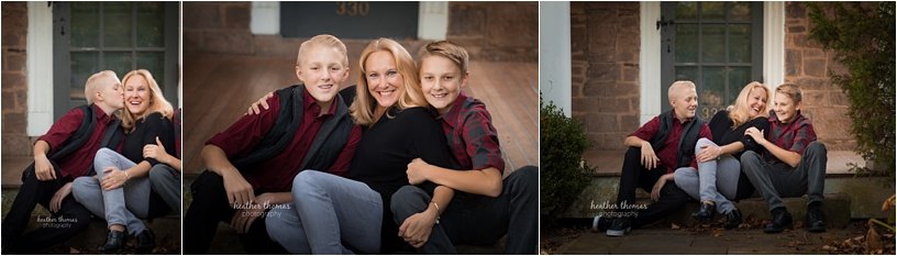 fall photo shoot philadelphia-31.jpg brothers wearing maroon and black with their parents outside for a fall photo shoot in newtown pa
