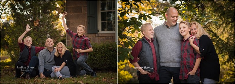 fall photo shoot philadelphia-53.jpg brothers wearing maroon and black with their parents outside for a fall photo shoot in newtown pa
