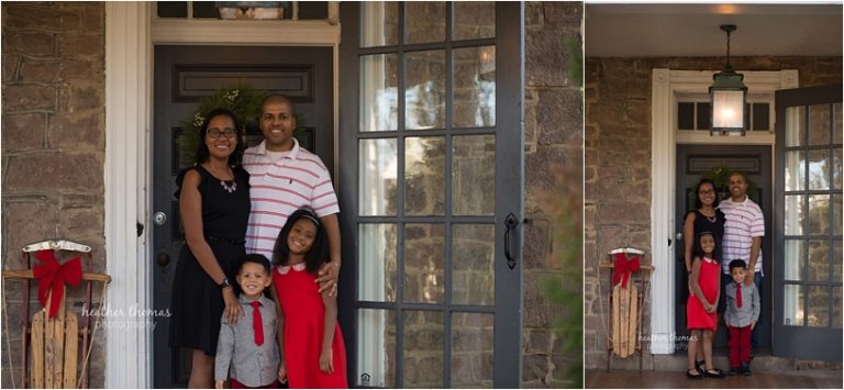 family of four dressed in black red and white outside the photo studio in newtown pa