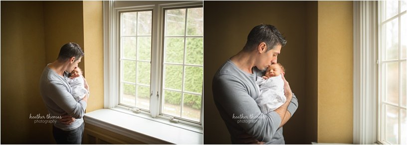 newborn photography bucks county pa-31.jpg newborn boy with his parents in their abington pa home posing for newborn portraits