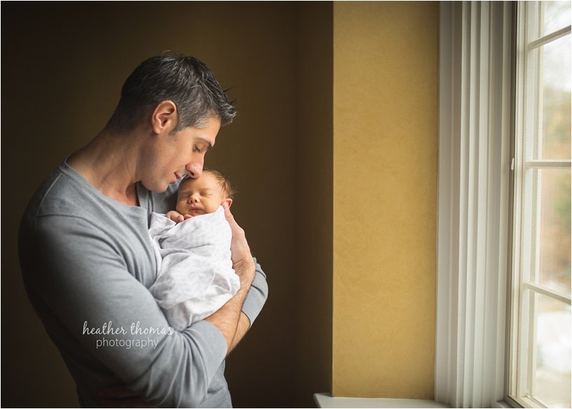 newborn photography bucks county pa-33.jpg newborn boy with his parents in their abington pa home posing for newborn portraits