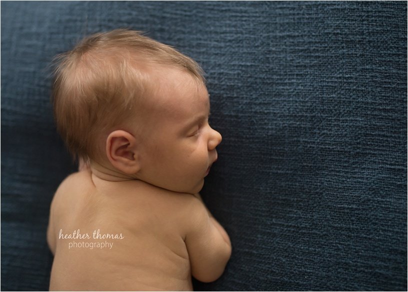 newborn photography bucks county pa-90.jpg newborn boy with his parents in their abington pa home posing for newborn portraits