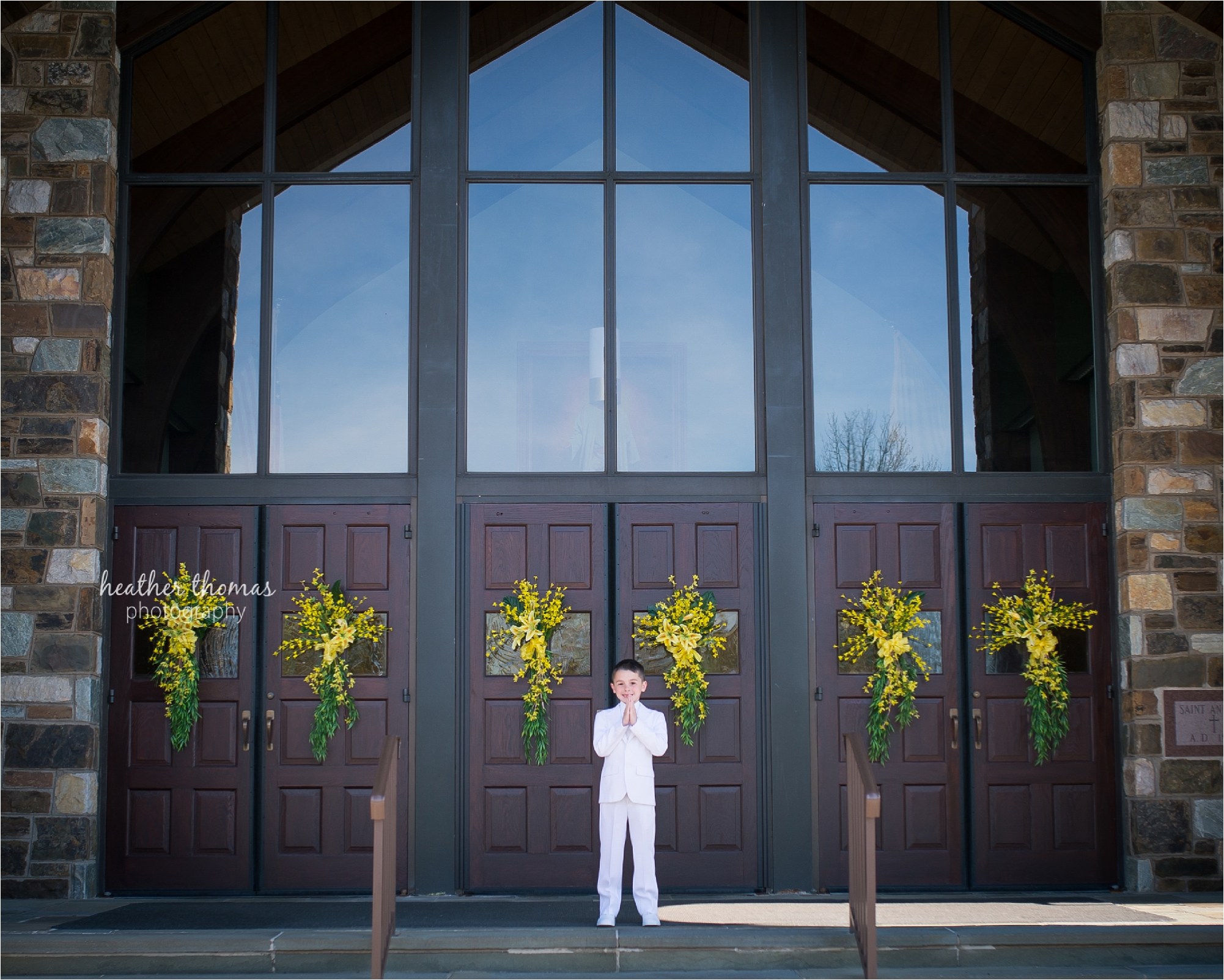 Newtown pa communion photography-1.jpg a boy dressed in all white for his first holy communion photo session with heather thomas photography in newtown