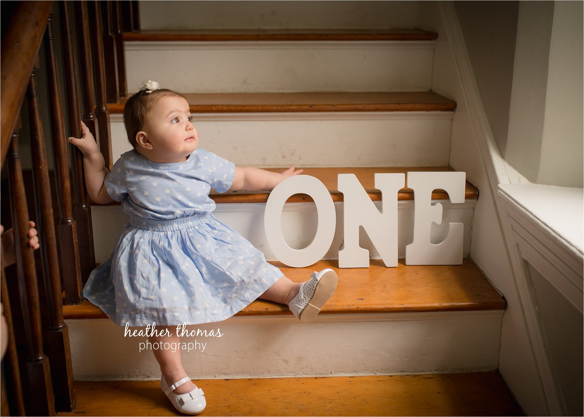 bucks county first birthday photographer-17.jpg a picture of a girl sitting on stairs