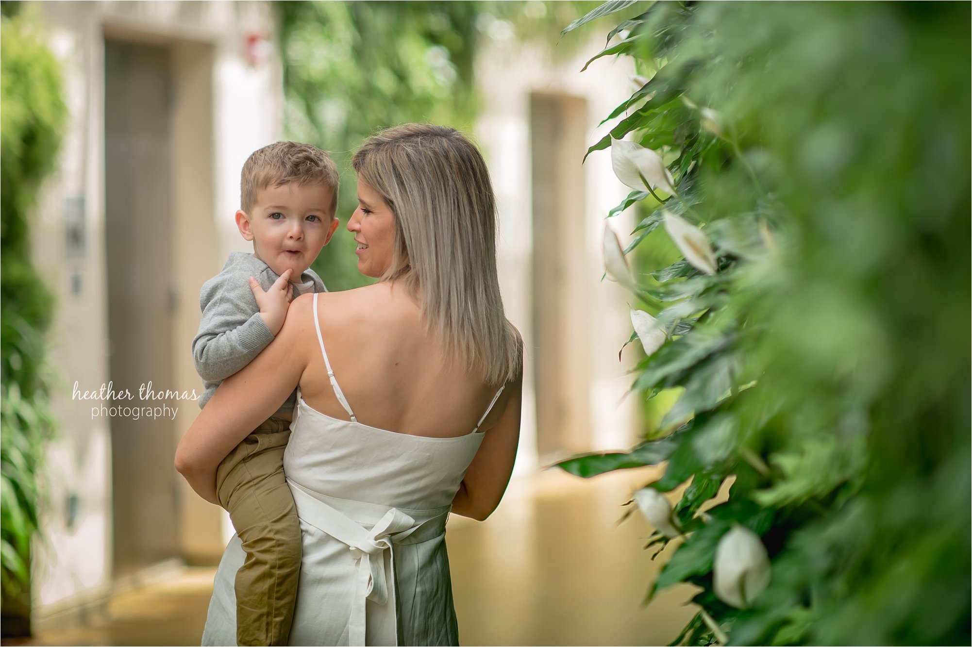 newtown pa family photographers-85.jpg mother and son at longwood garden with heather thomas photography