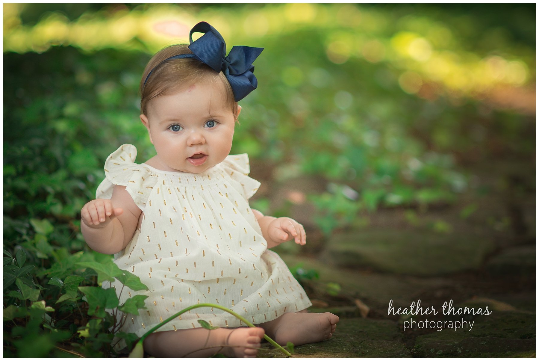 baby photo shoot philadelphia-43.jpg a 7 month old baby sitting outside in a gold dress for a photo shoot with heather thomas photography