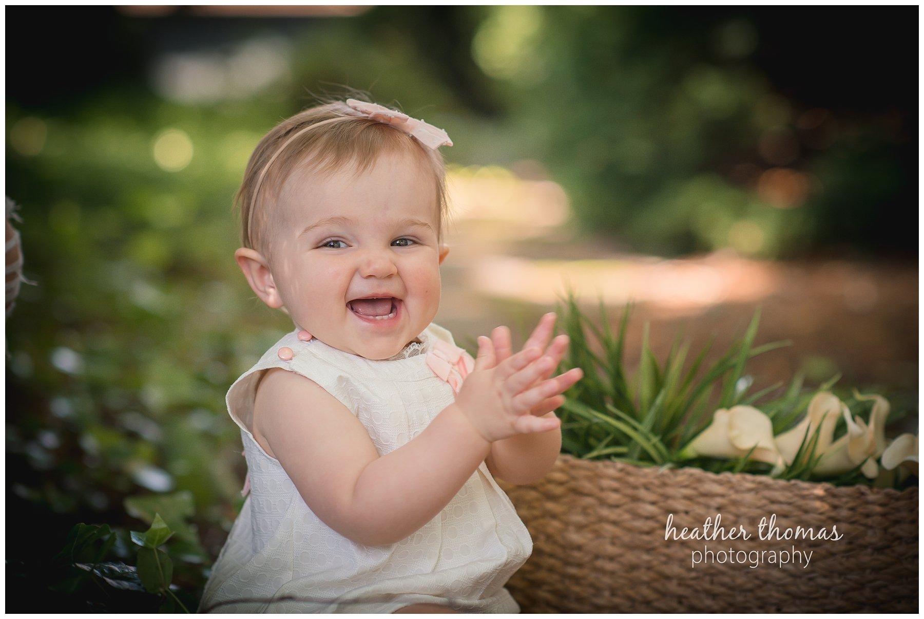 bucks county baby portraits-10.jpg an 8 month old baby smiling for the camera in philadelphia pa