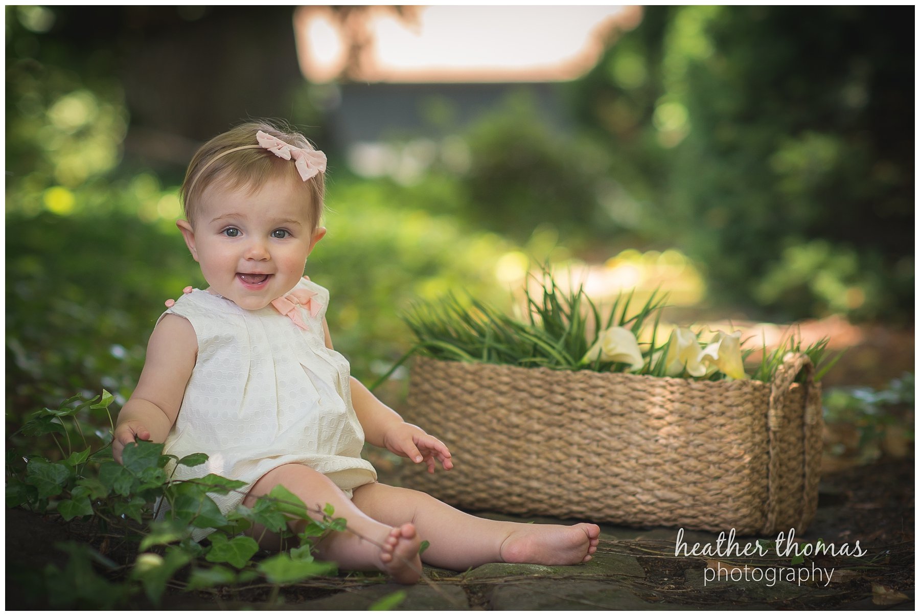 bucks county baby portraits-2.jpg an 8 month old baby smiling for the camera in philadelphia pa