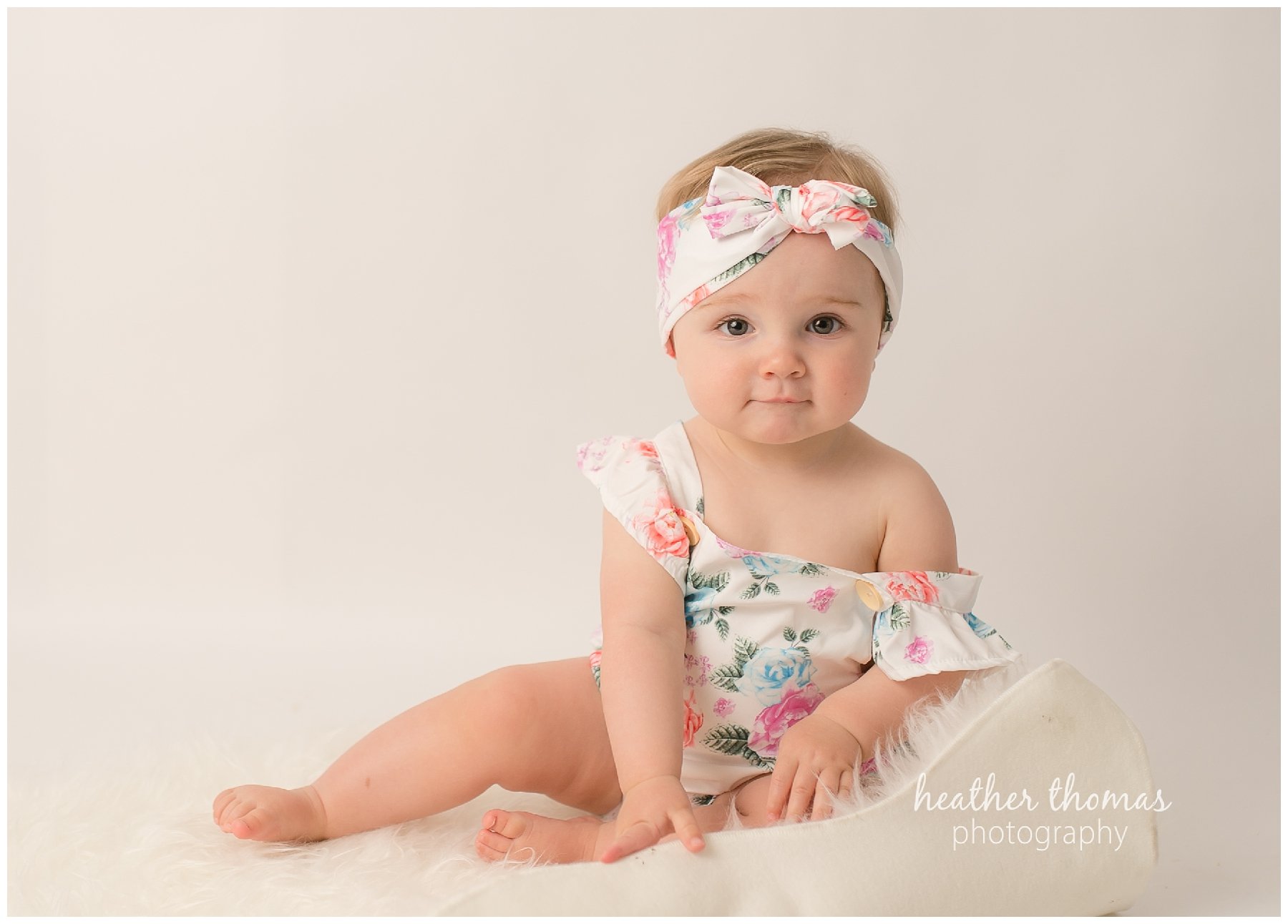 bucks county baby portraits-22.jpg an 8 month old baby smiling for the camera in philadelphia pa