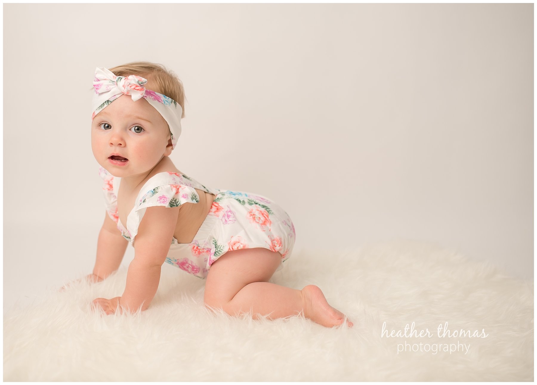 bucks county baby portraits-23.jpg an 8 month old baby smiling for the camera in philadelphia pa