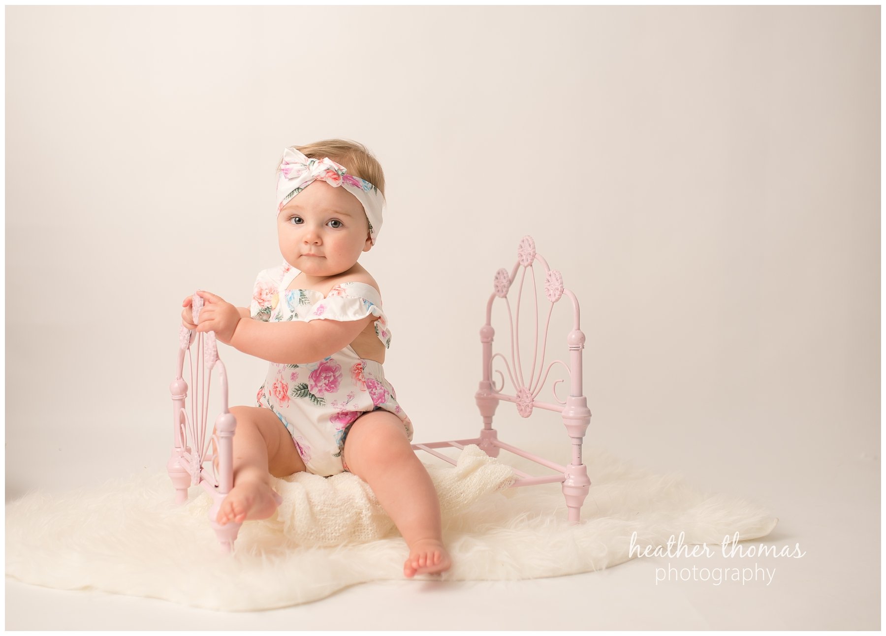 bucks county baby portraits-27.jpg an 8 month old baby smiling for the camera in philadelphia pa