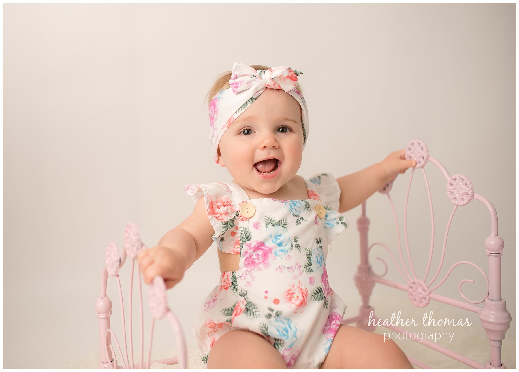 bucks county baby portraits-28.jpg an 8 month old baby smiling for the camera in philadelphia pa