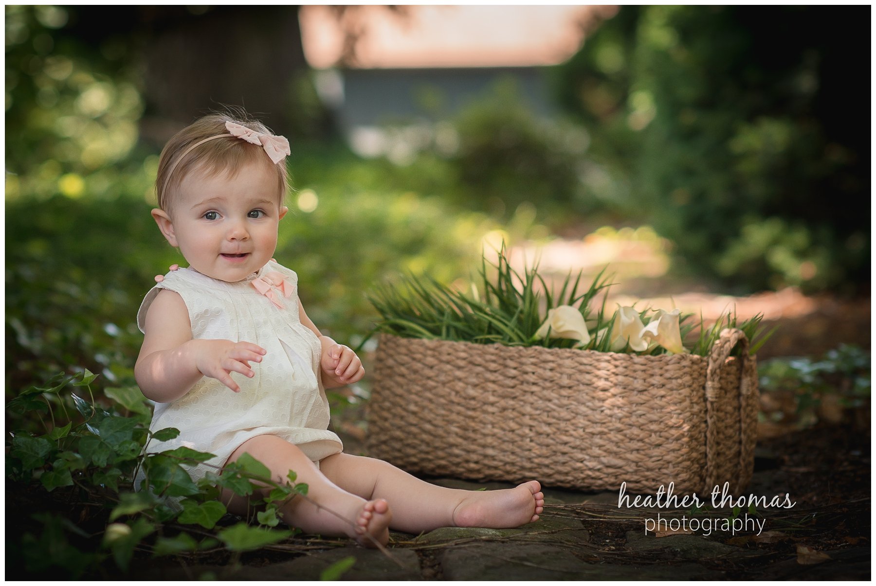 bucks county baby portraits-3.jpg an 8 month old baby smiling for the camera in philadelphia pa