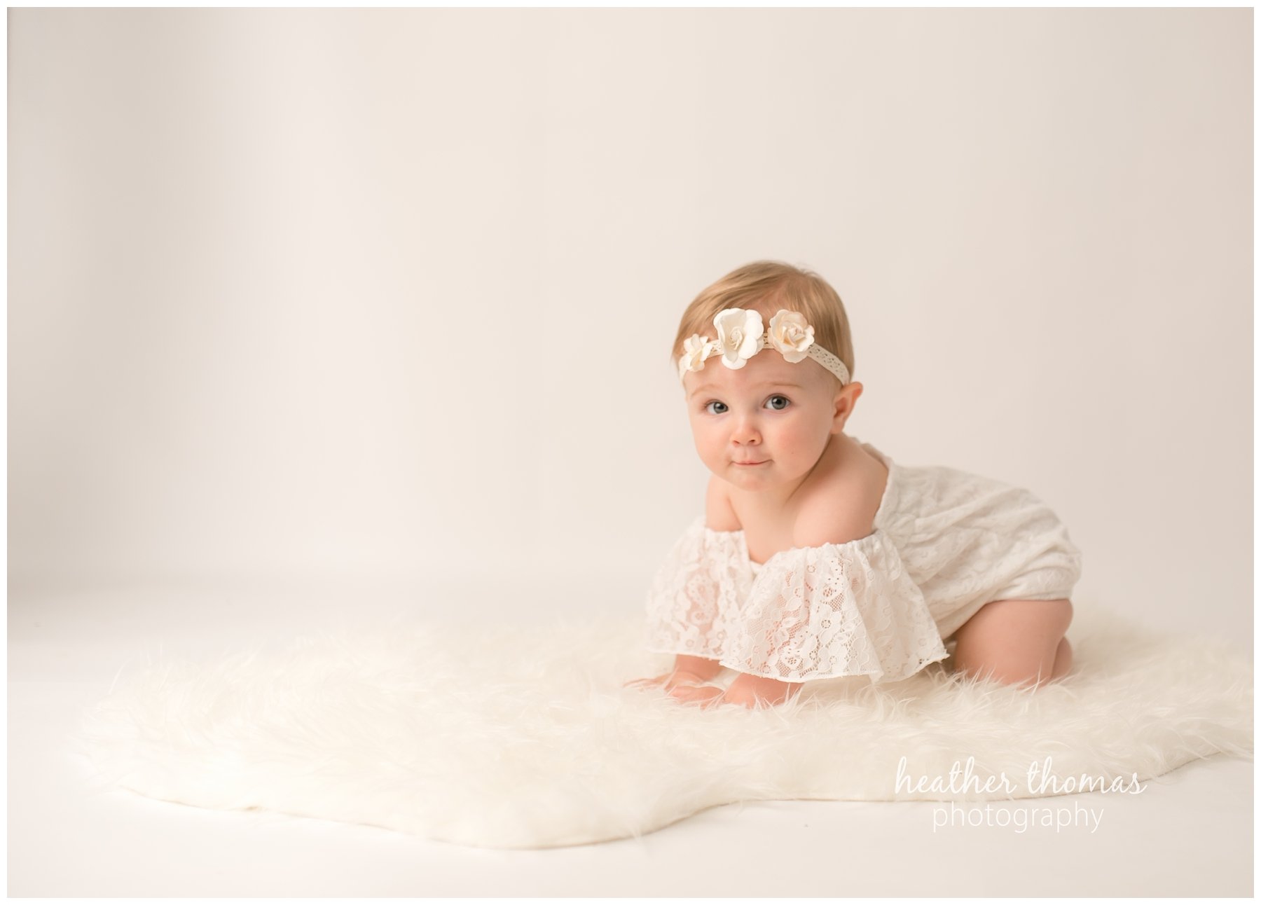 bucks county baby portraits-31.jpg an 8 month old baby smiling for the camera in philadelphia pa