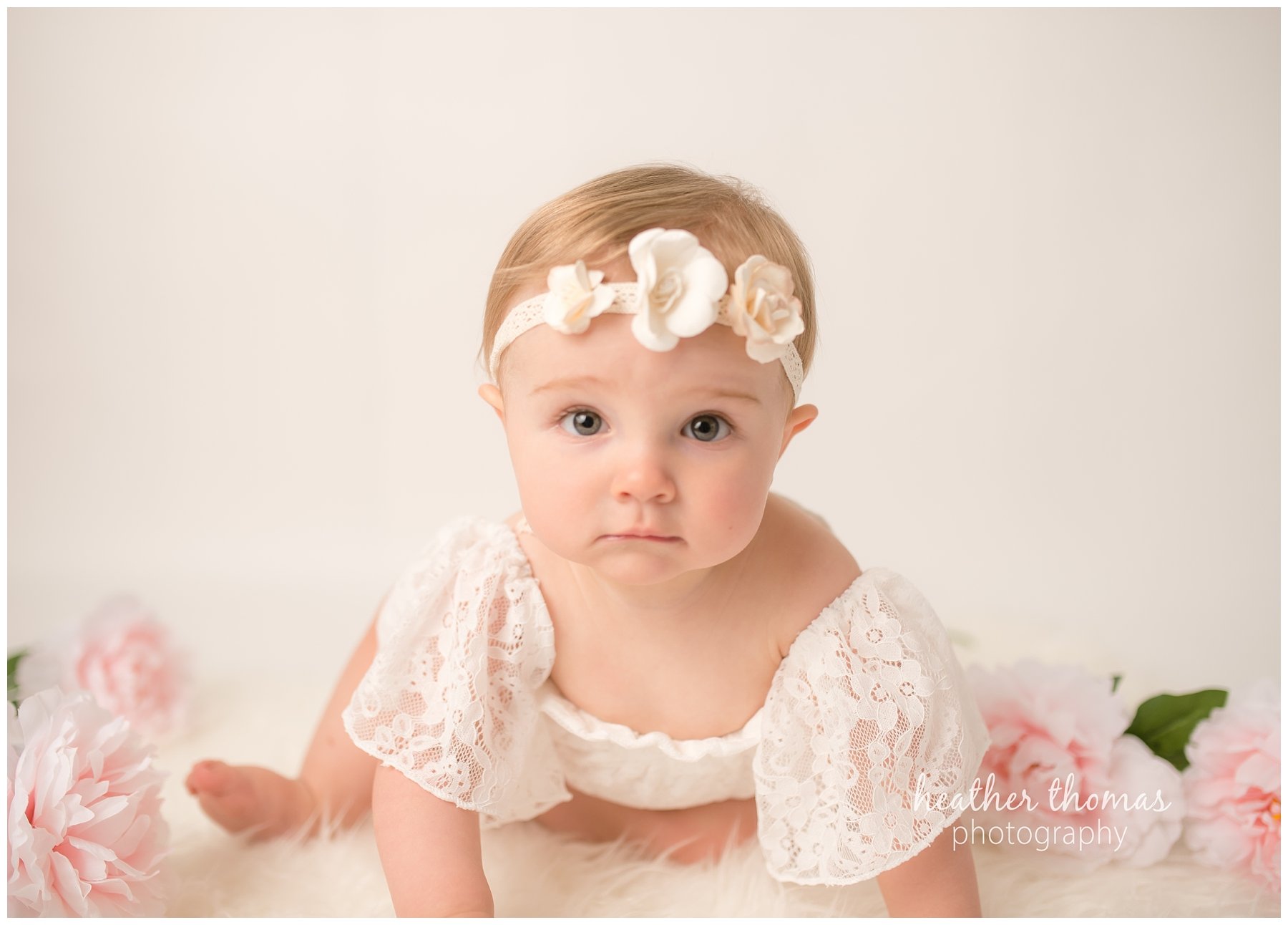 bucks county baby portraits-37.jpg an 8 month old baby smiling for the camera in philadelphia pa
