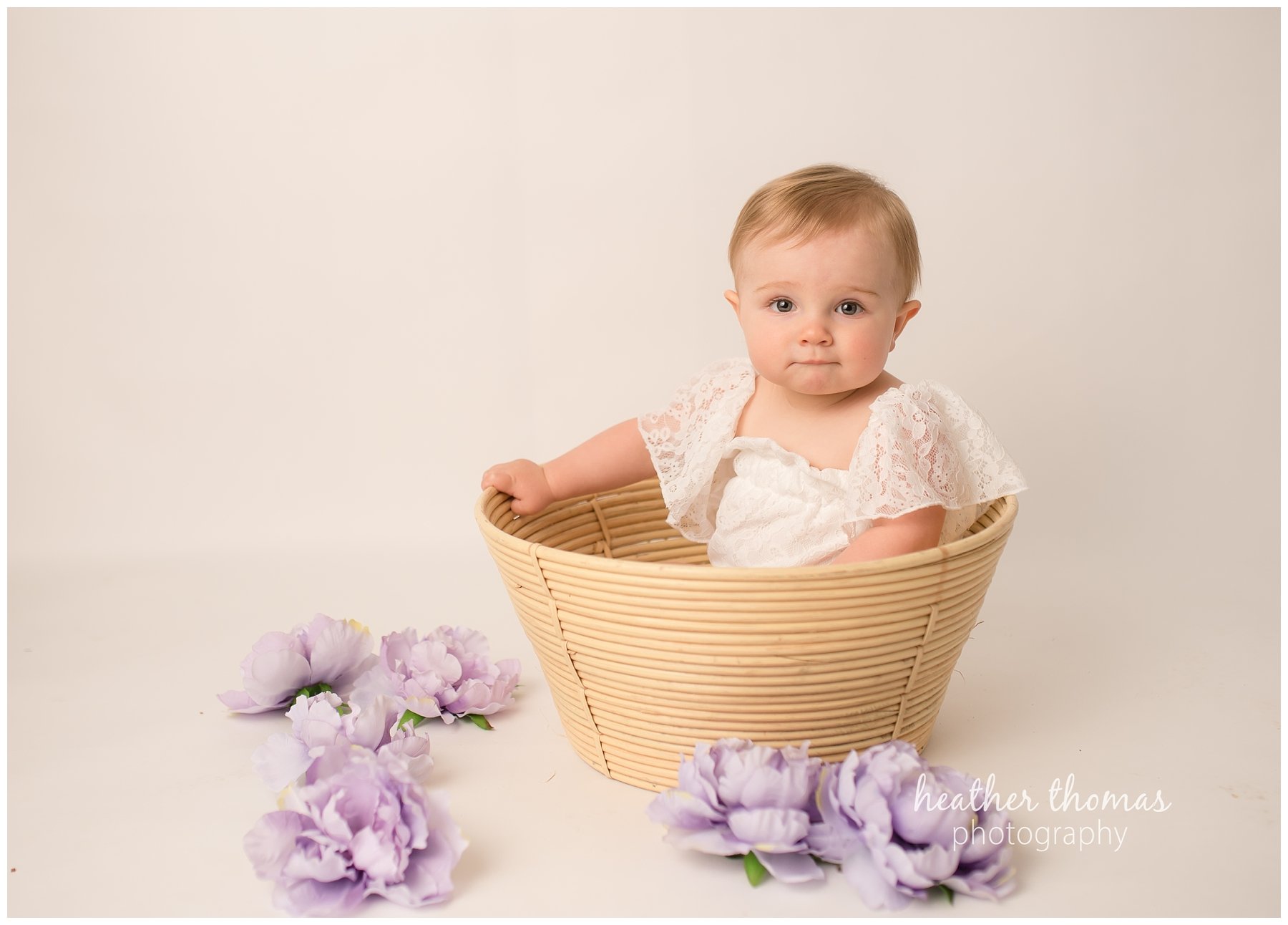 bucks county baby portraits-43.jpg an 8 month old baby smiling for the camera in philadelphia pa