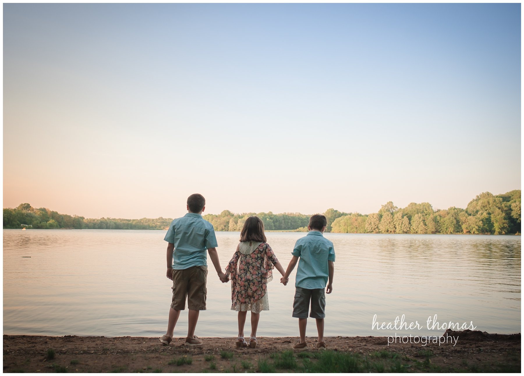 core creek family portrait-19.jpg a picture of three siblings holding hands in langhorne pa
