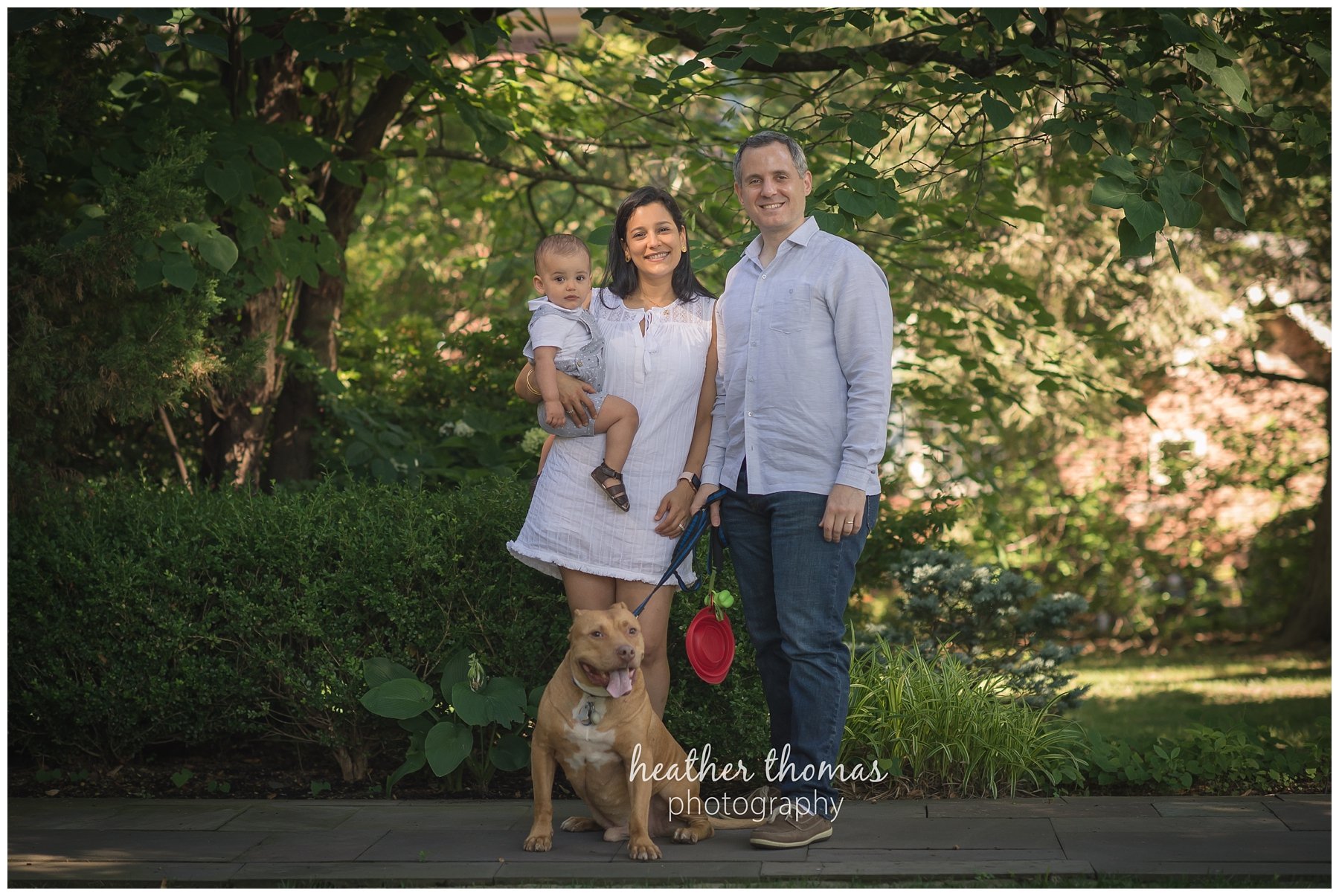 first birthday cake smash pesola-29.jpg a family of three with their one year old boy at their photography session in Newtown