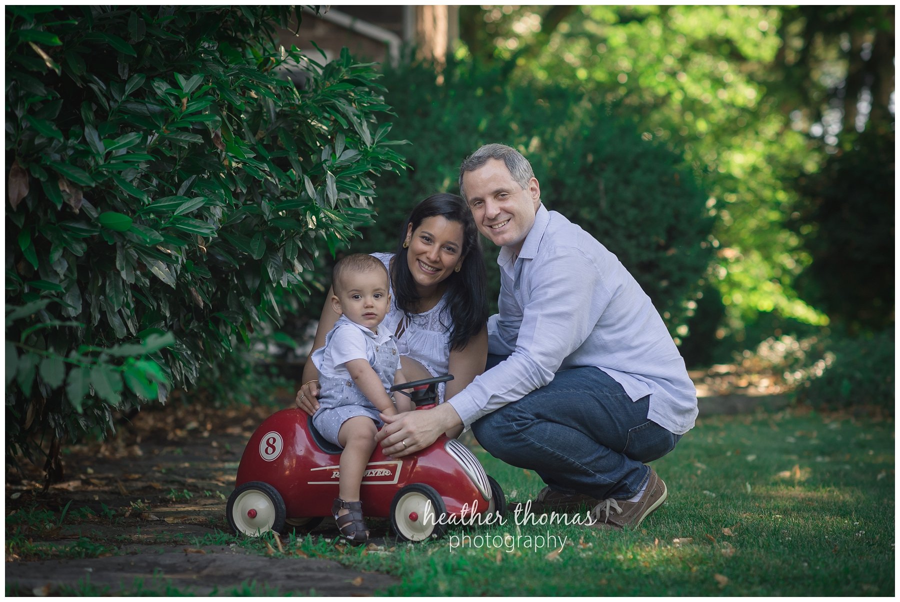 first birthday cake smash pesola-45.jpg a family of three with their one year old boy at their photography session in Newtown