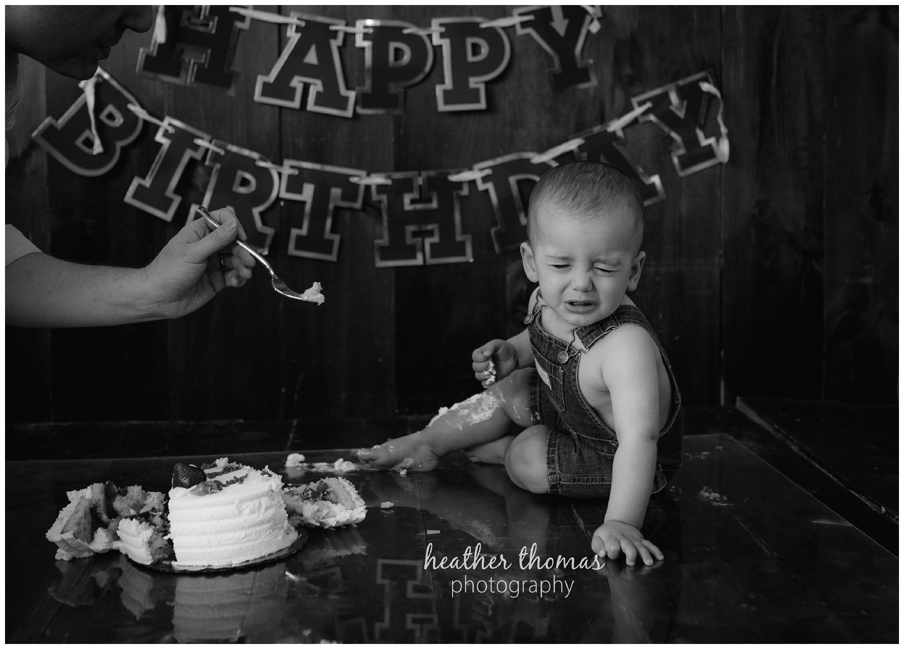 first birthday cake smash pesola-57.jpg a family of three with their one year old boy at their photography session in Newtown