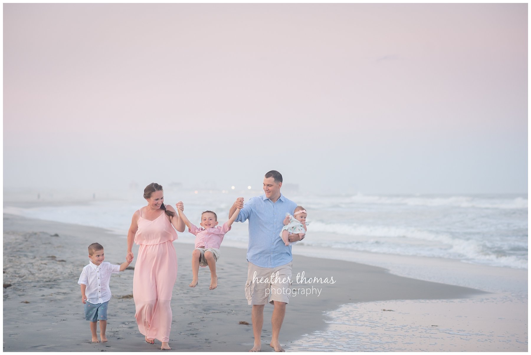 family beach photography ocnj-61.jpg a family of 5 walking along the shore in ocnj