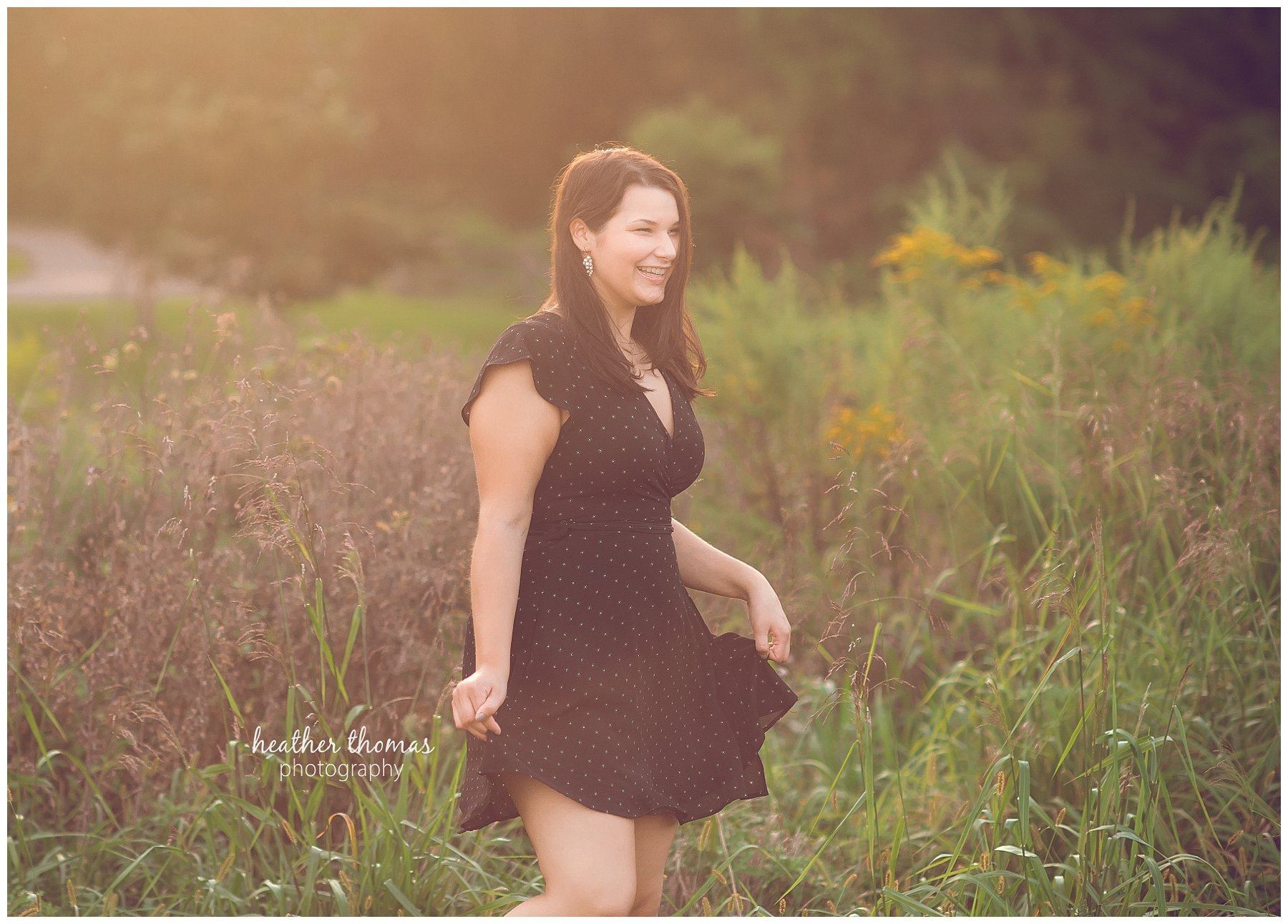 Senior Pictures Philadelphia-18.jpg a girl twirling around at her senior photo shoot in philadelphia