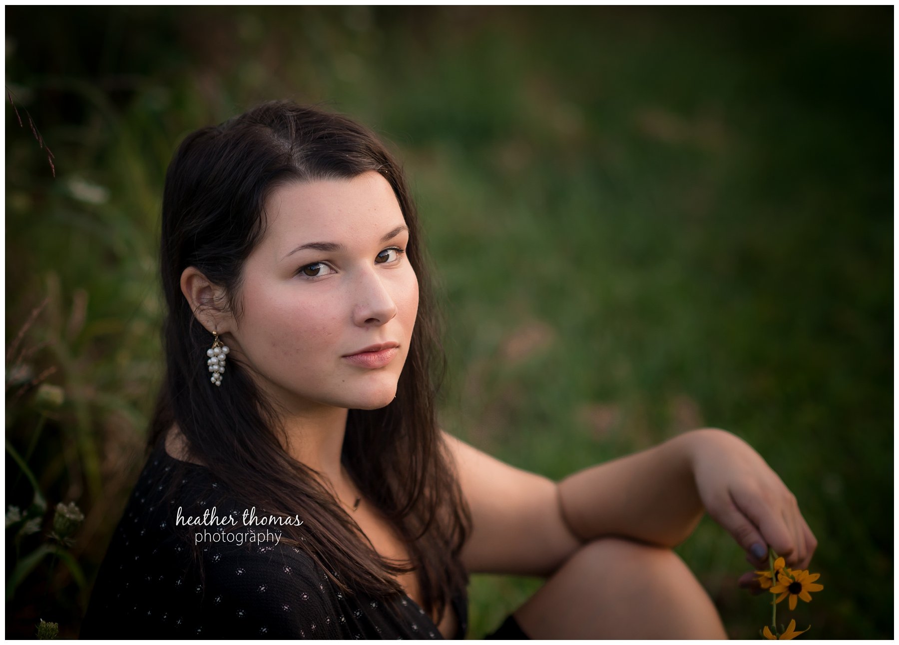 Senior Pictures Philadelphia-46.jpg a teenage girl staring at the camera at her photo shoot with heather thomas photography