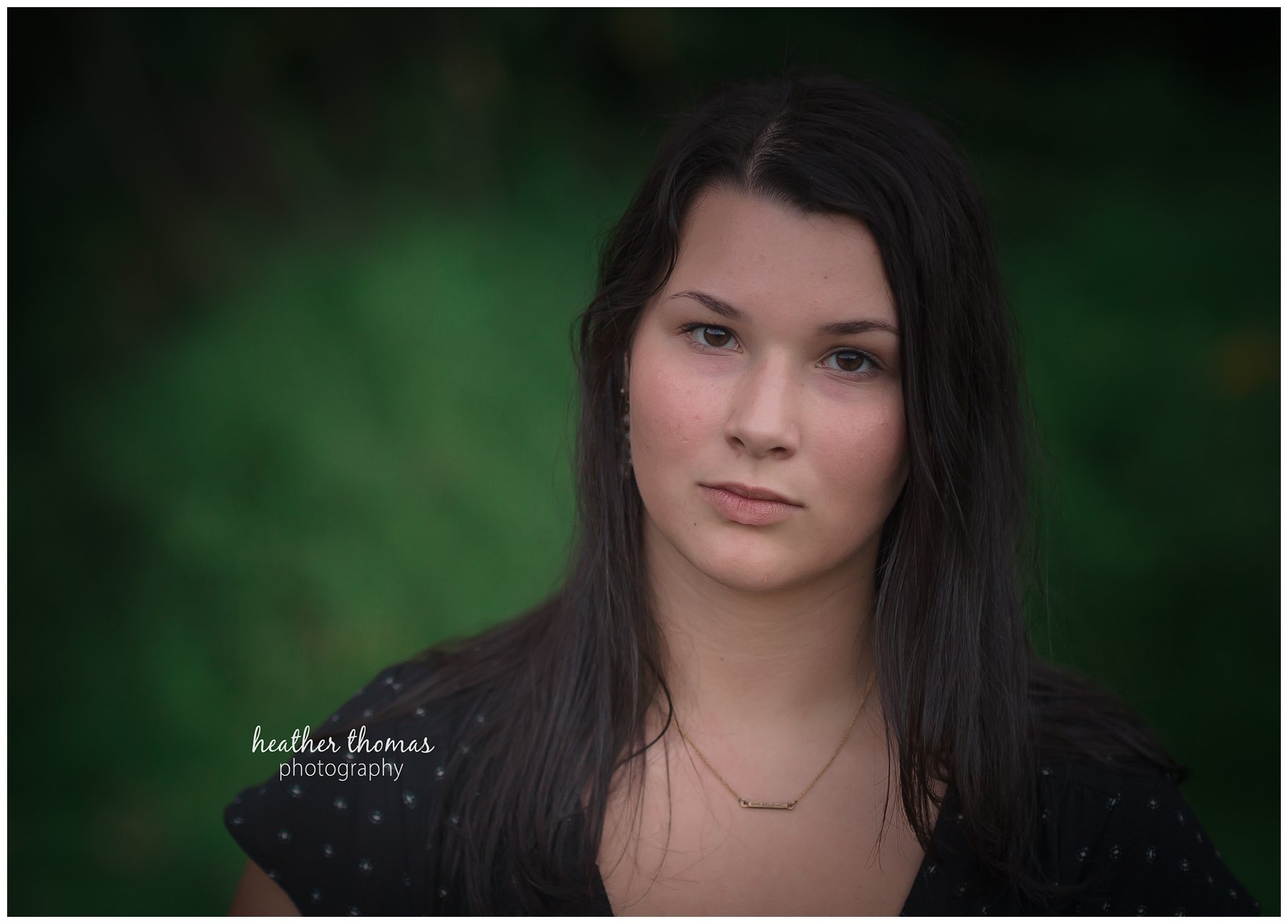 Senior Pictures Philadelphia-63.jpg a teenage girl staring at the camera at her photo shoot with heather thomas photography