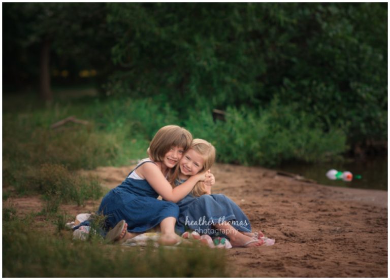5 Fab Family-Friendly Outdoor Photo Session Locations near Newtown, Lower Bucks County, PA sisters hugging at core creek park in langhorne