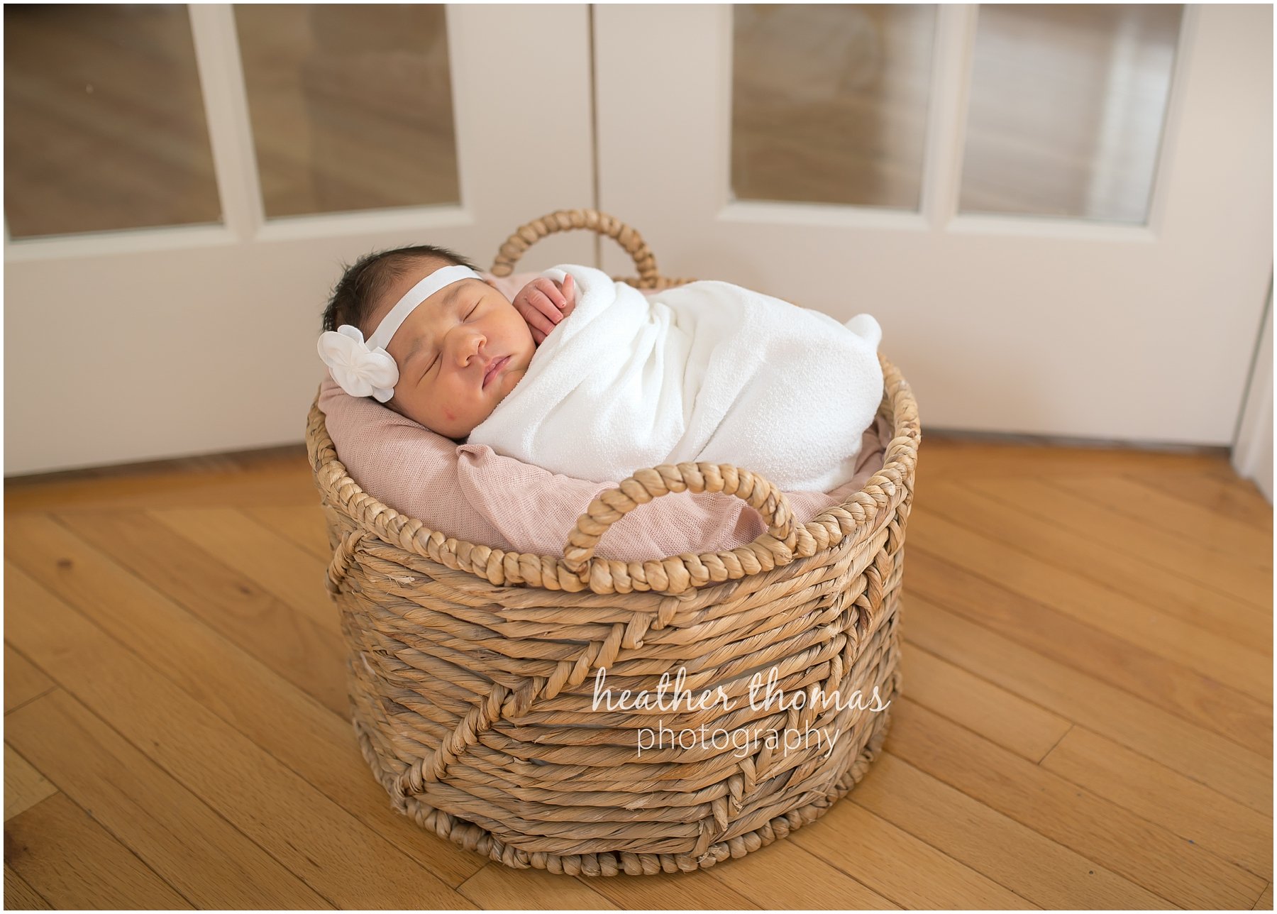 ricketti-newborn-photos-newtown-pa-43.jpg a newborn girl in a basket in newtown pa