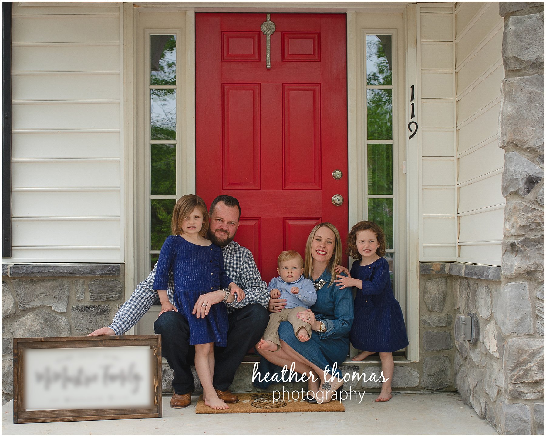montgomery county family photographer-36.jpg a picture of a family of 5 sitting outside their home in lansdale