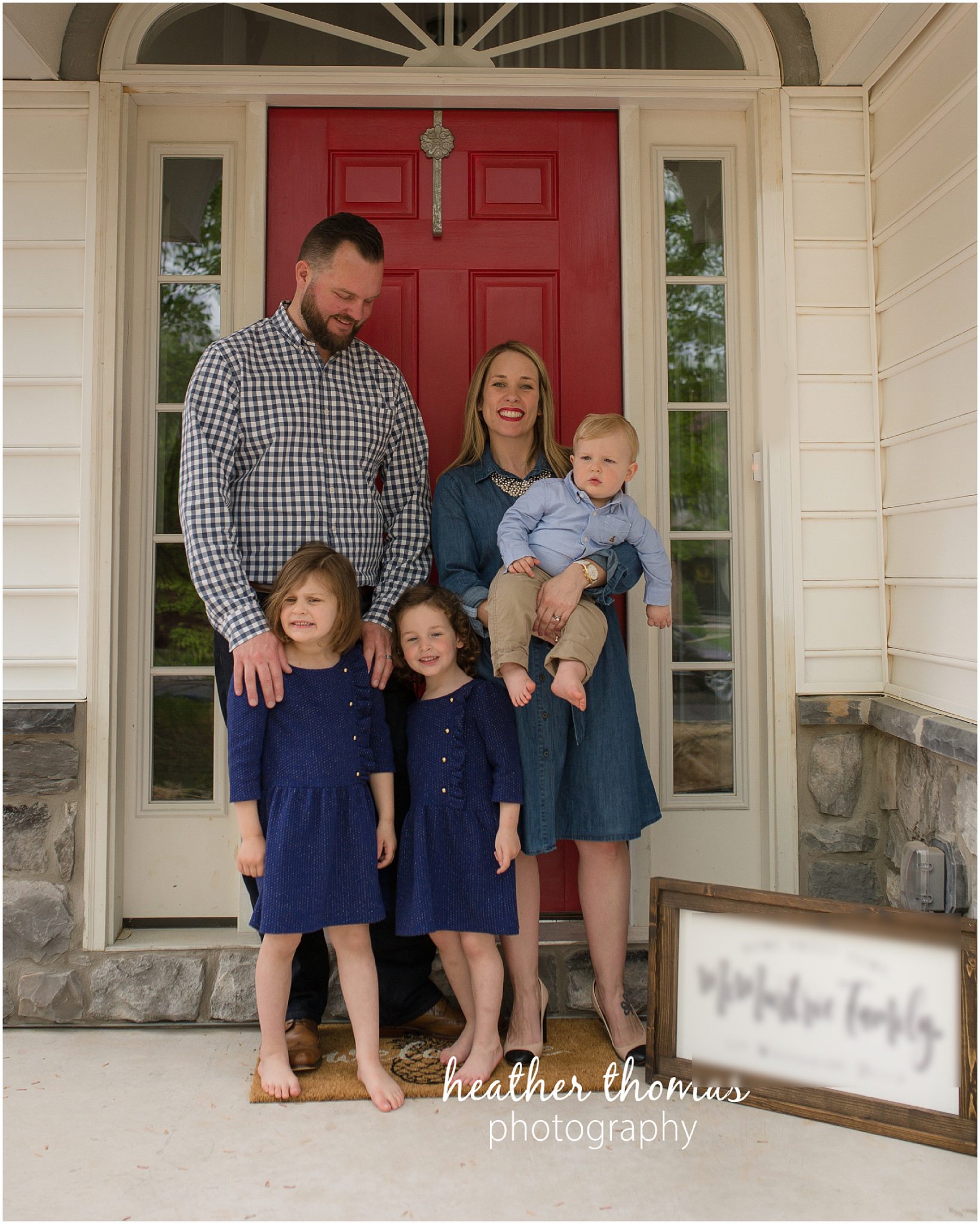 montgomery county family photographer-42.jpg a picture of a family standing outside their home in lansdale