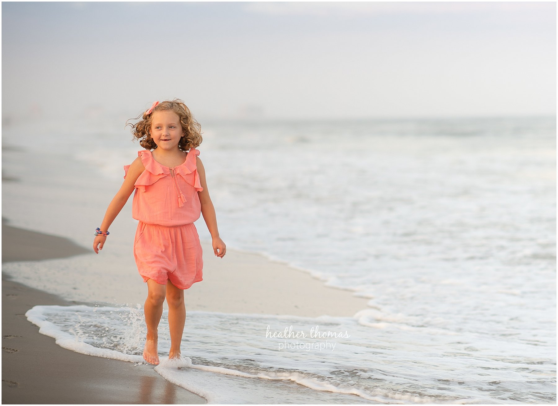 The M Family | OCNJ Family Portraits young girl on the beach in ocean city nj