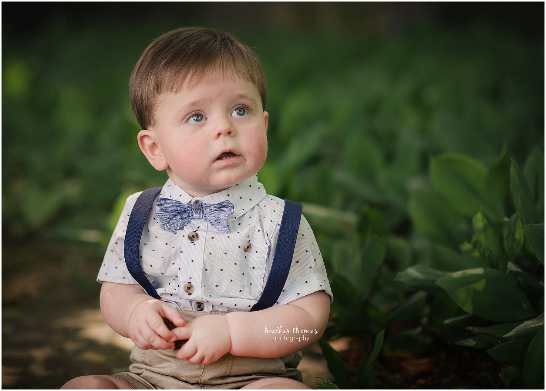 first birthday photos philadelphia-43.jpg a closeup picture of a boy looking up in newtown pa