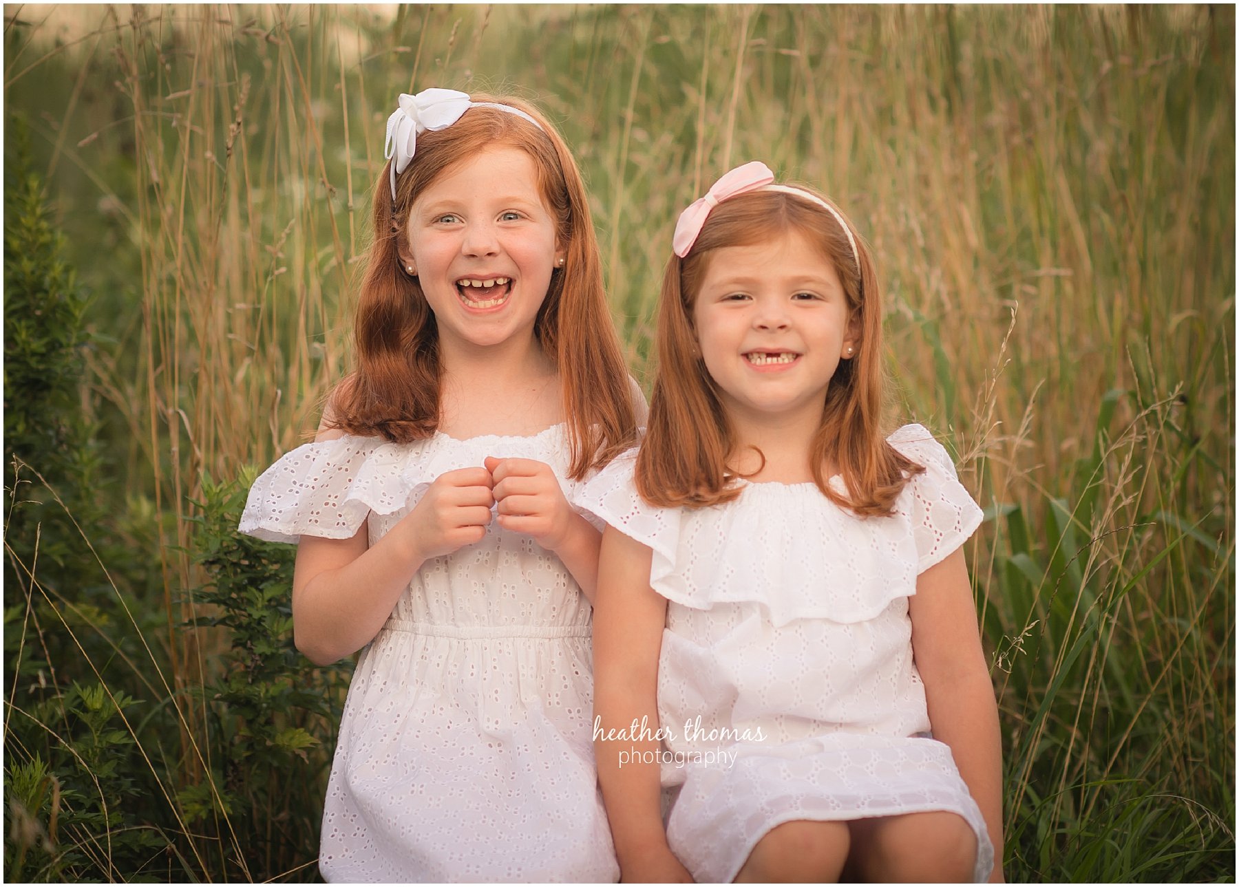 philadelphia photography session-19.jpg smiling sisters in a field in philadelphia