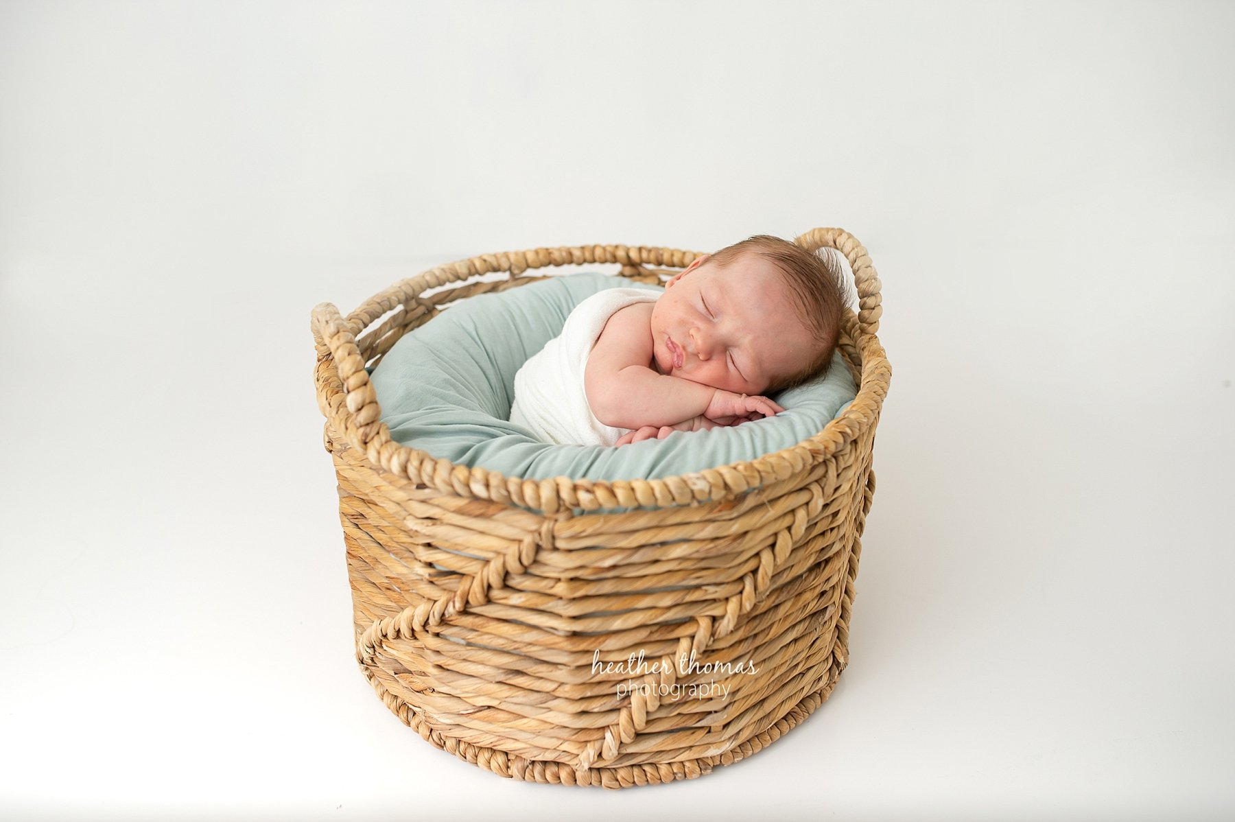 newborn portraits in bucks county pa a 3 week old baby in a basket