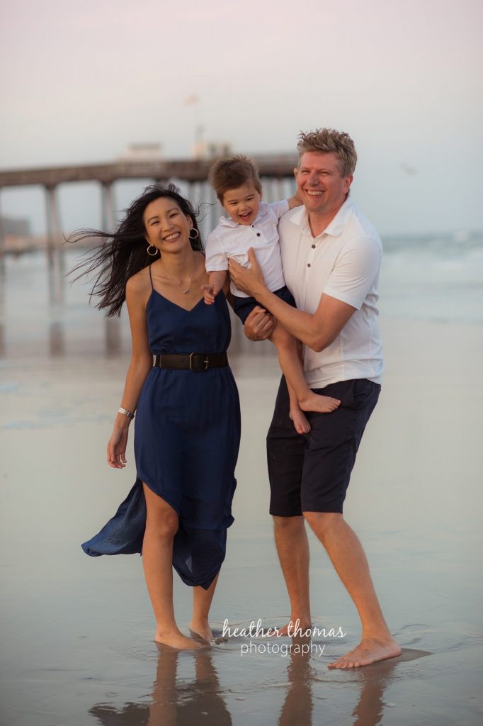 Family Photo Session in Ocean City, NJ family of three beach portrait in nj