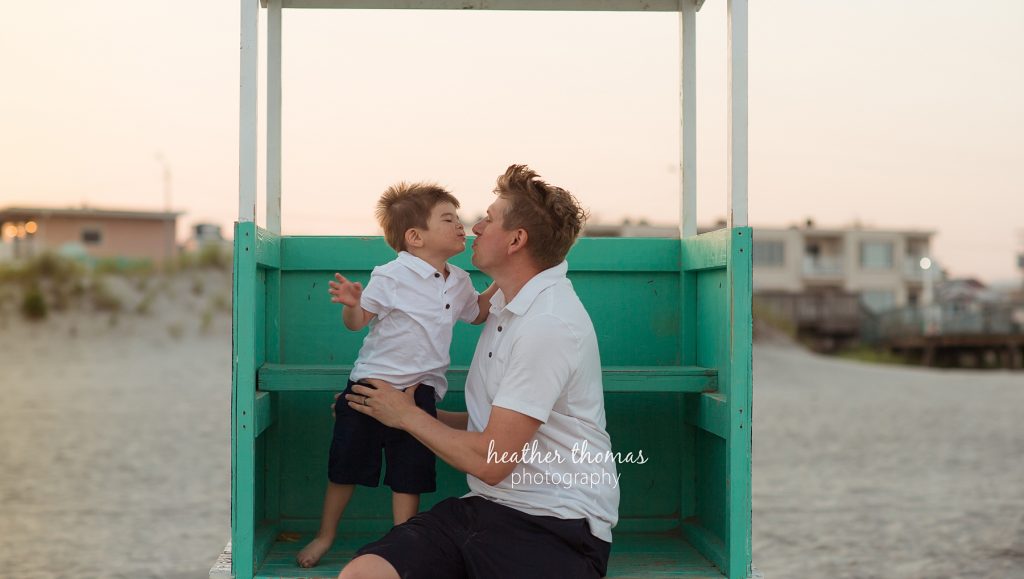 Family Photo Session in Ocean City, NJ father and young son on ocean city beach
