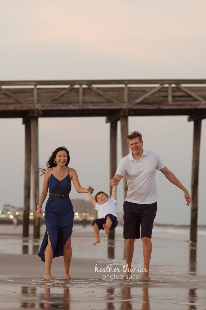 Family Photo Session in Ocean City, NJ family with young son beach portrait