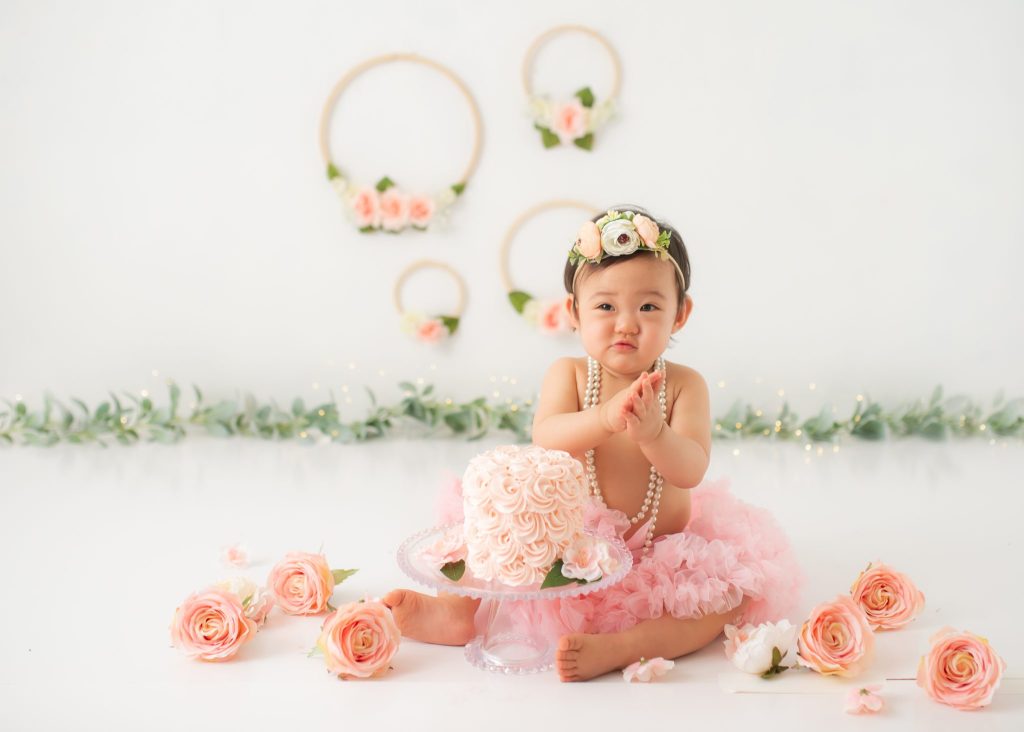 Philadelphia Birthday Photographer a one year old baby at at sunshine themed cake smash with Philadelphia Cake Smash Photographer Heather Thomas
