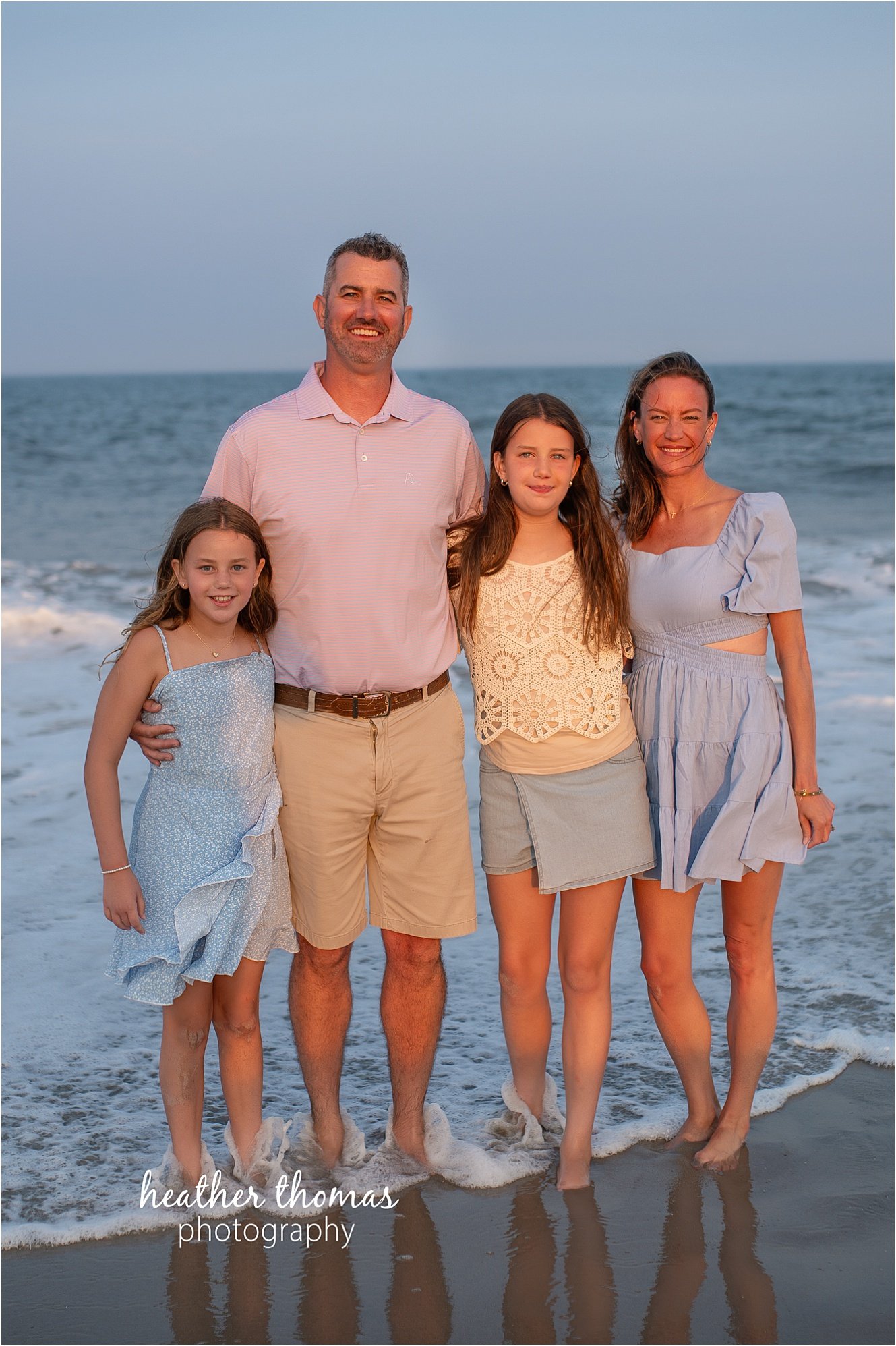sea isle city family portraits-20.jpg a family of four at a beach photo shoot with Heather thomas photography
