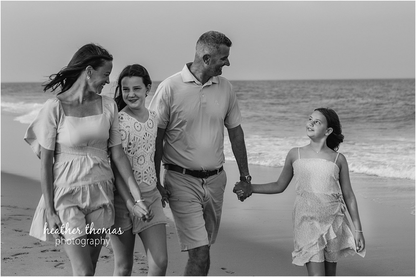 sea isle city family portraits-22.jpg a family of four at a beach photo shoot with Heather thomas photography