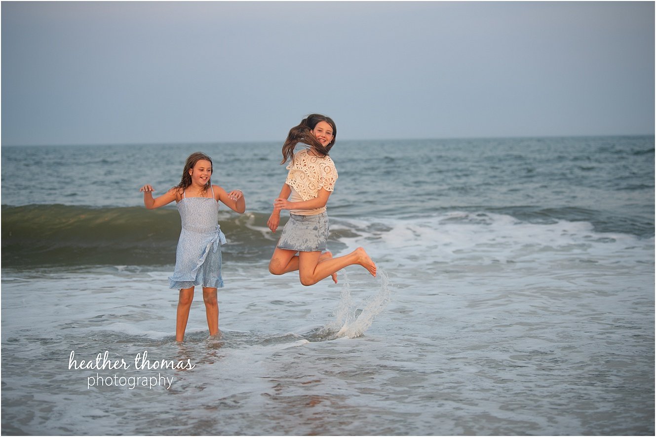 sea isle city family portraits-49.jpg a family of four at a beach photo shoot with Heather thomas photography