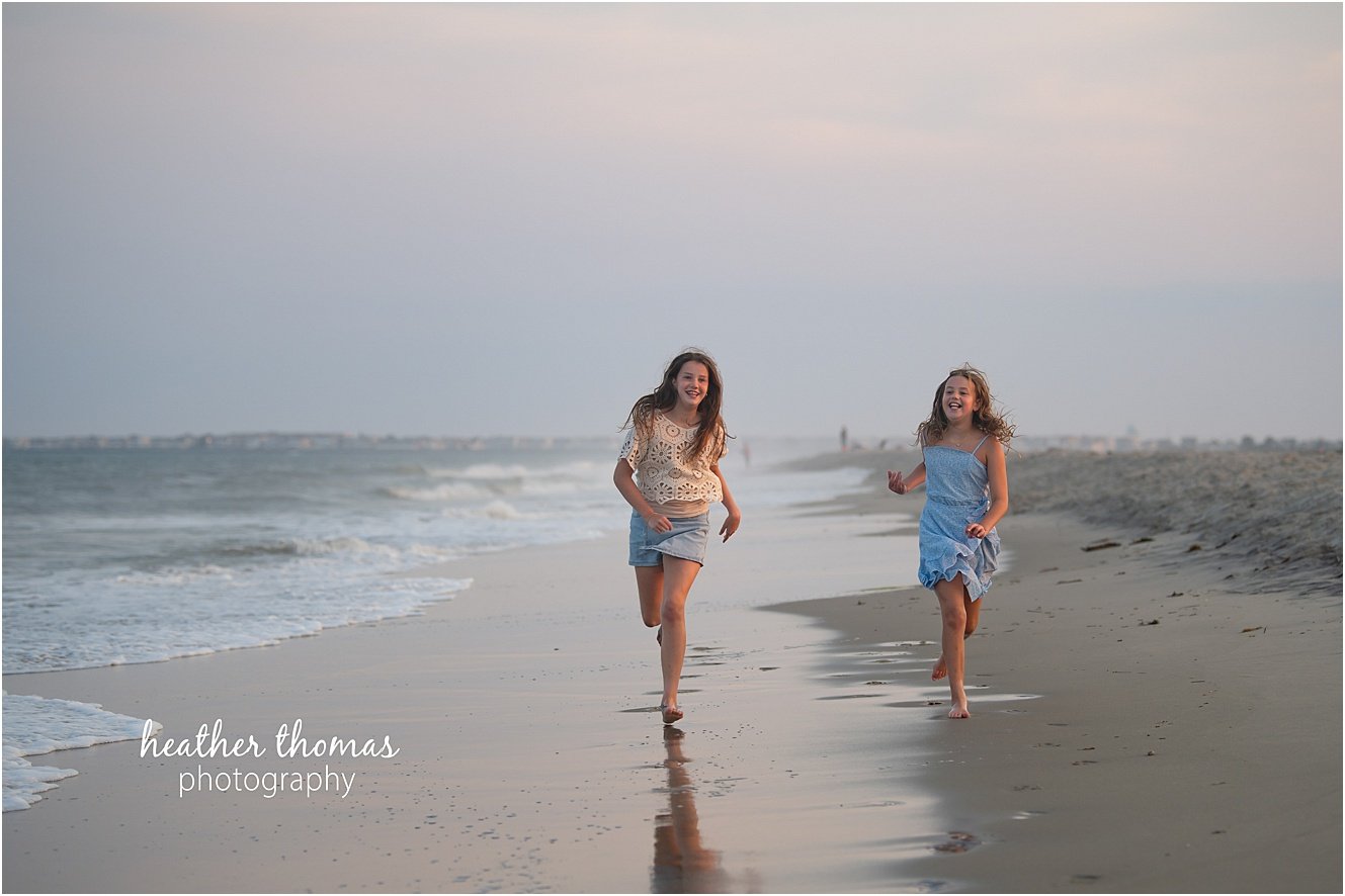 sea isle city family portraits-52.jpg a family of four at a beach photo shoot with Heather thomas photography
