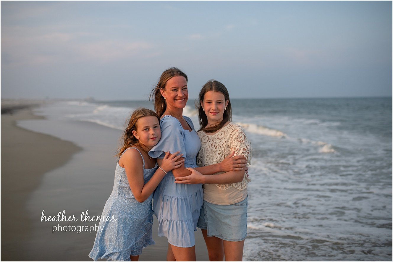 sea isle city family portraits-71.jpg a family of four at a beach photo shoot with Heather thomas photography