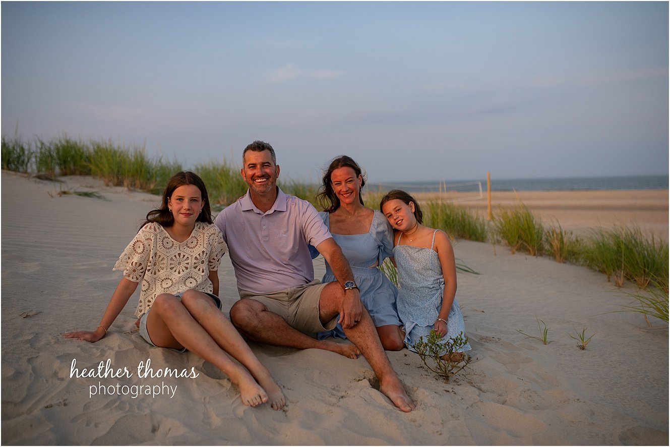 sea isle city family portraits-85.jpg a family of four at a beach photo shoot with Heather thomas photography