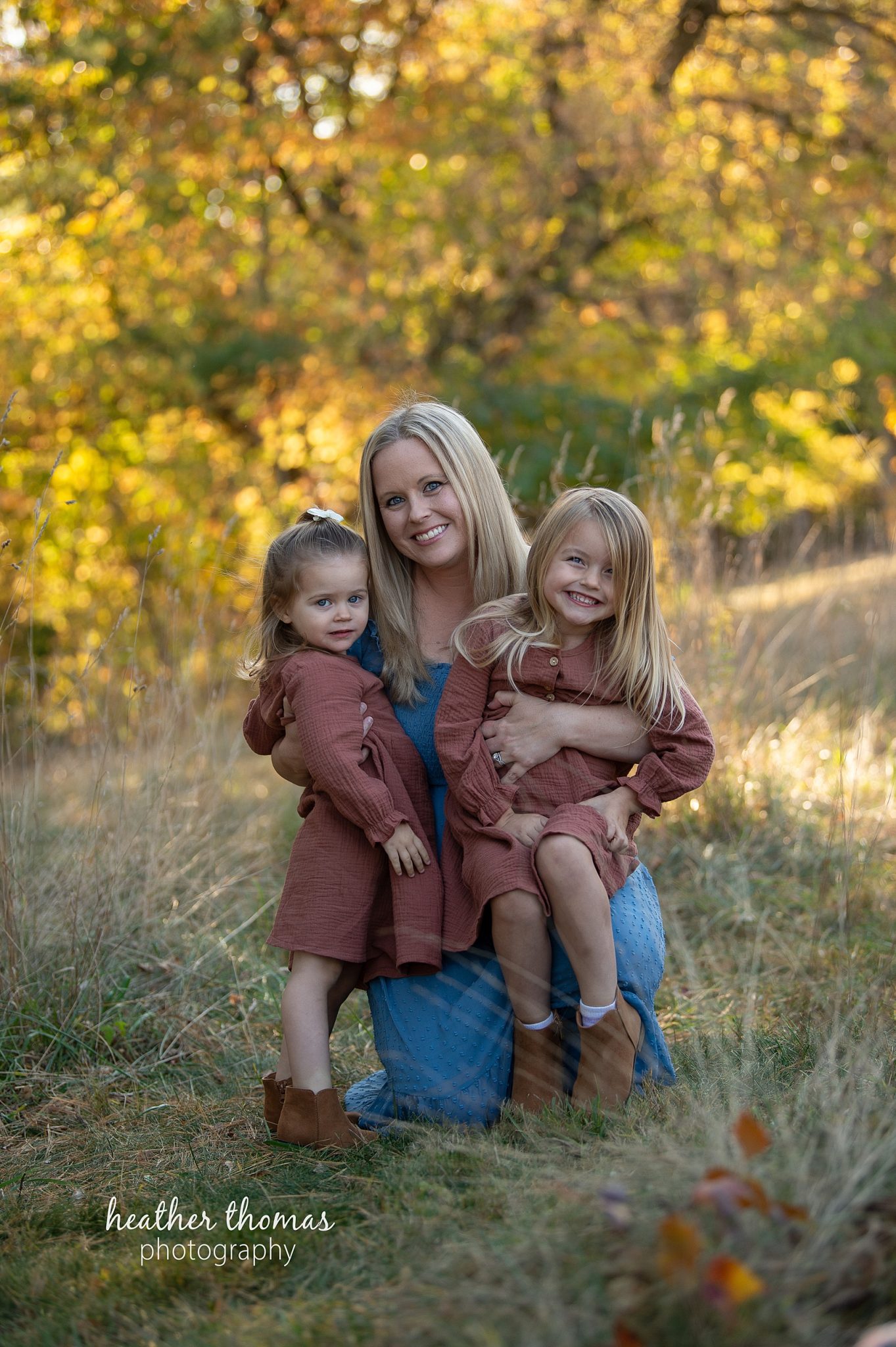 Bucks-County-Family-Photographer-Heather-Thomas-Photography-34.jpg a mother hugging her daughters at a Tyler State Park Family Photography Session